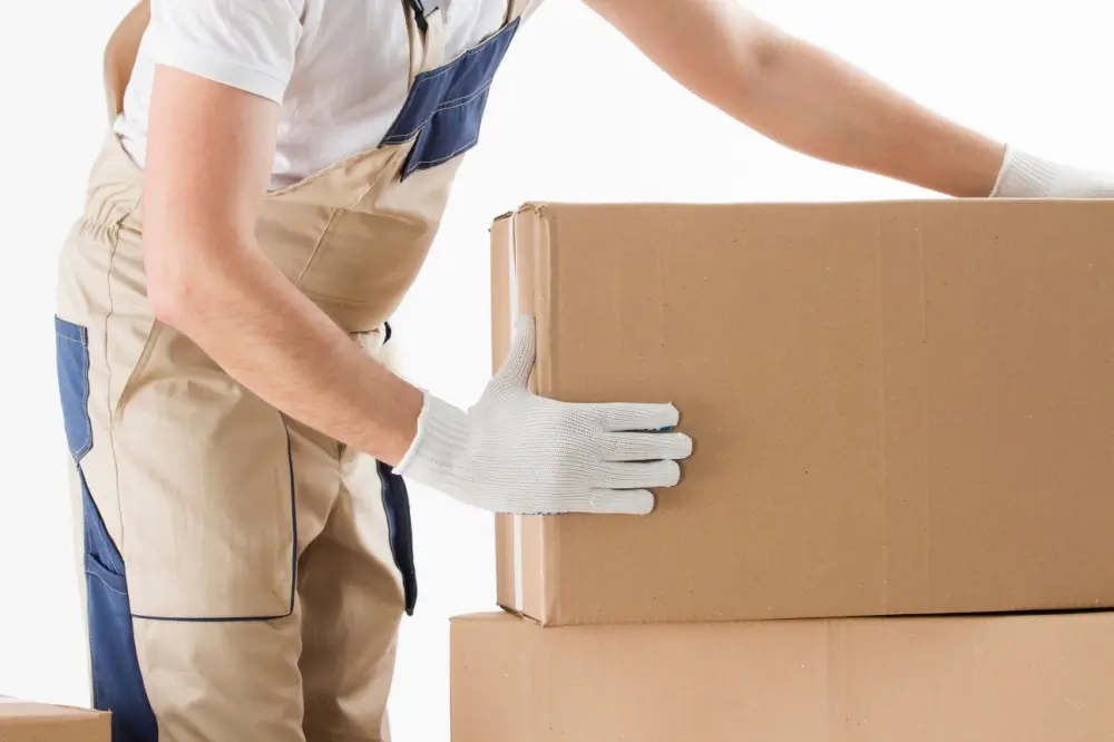a staff of packers and movers packing a box